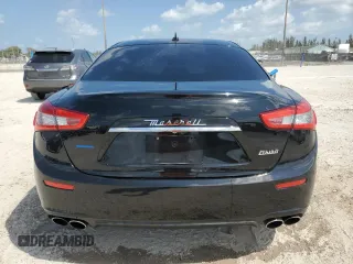 2016 Maserati Ghibli z VIN ZAM57XSAXG1174741, wystawiony jako Copart lot #51975655 z przebiegiem 127 182 mil mil oraz Tytuł czysty. Historia ofert i sprzedaży dostępna na DreamBid. Obrazek 6.