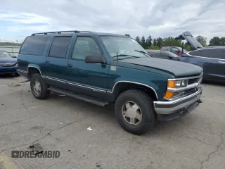 1999 Chevrolet Suburban with VIN 1GNFK16R9XJ516000, listed as a Copart auction lot 73854994 with 263,079 mi miles and Salvage Title. Bid and sale history available at carsss.com. Image 4.