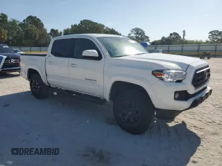 2023 Toyota Tacoma SR5 z VIN 3TMAZ5CN3PM212056, wystawiony jako Copart lot #57217735 z przebiegiem 36 533 mil mil oraz Szkoda całkowita • Salvage title. Historia ofert i sprzedaży dostępna na DreamBid. Obrazek 4.
