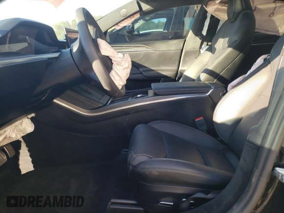 2023 Tesla Model S Plaid с VIN 5YJSA1E63PF524294, выставлен на аукционе Copart как лот 70292844 с пробегом Не указан миль и Списание • Salvage title. История ставок и продаж доступна на DreamBid. Изображение 7.