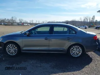 2015 Volkswagen Jetta Sedan 1.8T SE w/Connectivity with VIN 3VWD07AJ2FM312146, listed as a IAAI auction lot 41843238 with 107,741 mi miles. Bid and sale history available at carsss.com. Image 14.
