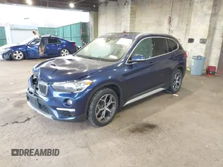 2019 BMW X1 xDrive28i with VIN WBXHT3C55K5L37338, listed as a IAAI auction lot 41934461 with 87,913 mi miles. Bid and sale history available at carsss.com. Image 17.