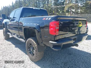 2018 Chevrolet Silverado 1500 LT with VIN 3GCUKREC7JG544365, listed as a IAAI auction lot 42055441 with 57,832 mi miles. Bid and sale history available at carsss.com. Image 3.