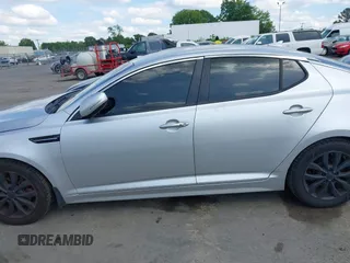 2015 Kia Optima EX with VIN 5XXGN4A70FG360623, listed as a IAAI auction lot 42112315 with 262,058 mi miles and . Bid and sale history available at carsss.com. Image 14.