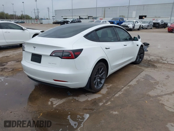 2021 Tesla Model 3 Long Range with VIN 5YJ3E1EB3MF059713, listed as a IAAI auction lot 41778289 with 52,211 mi miles. Bid and sale history available at carsss.com. Image 4.