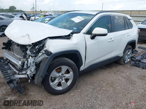 2020 Toyota RAV4 XLE with VIN JTMW1RFV0LD521893, listed as a IAAI auction lot 42701228 with 34,647 mi miles and . Bid and sale history available at DreamBid. Image 18.
