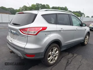 2014 Ford Escape Titanium с VIN 1FMCU0J98EUC28001, выставлен на аукционе IAAI как лот 42442784 с пробегом 163 159 миль миль и . История ставок и продаж доступна на DreamBid. Изображение 4.