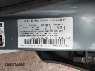 2012 Mazda 3 i Grand Touring with VIN JM1BL1W72C1676815, listed as a IAAI auction lot 42320014 with 93,933 mi miles and . Bid and sale history available at DreamBid. Image 9.