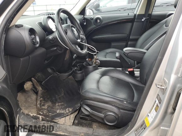 2014 MINI Countryman z VIN WMWZB3C55EWR36269, wystawiony jako Copart lot #51845265 z przebiegiem 167 558 mil mil oraz Czysty tytuł • Clean title. Historia ofert i sprzedaży dostępna na DreamBid. Obrazek 7.