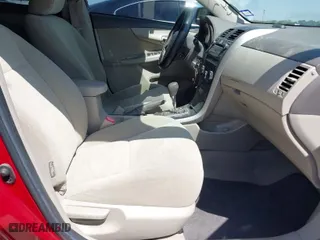 2010 Toyota Corolla with VIN 1NXBU4EE2AZ165885, listed as a IAAI auction lot 42007789 with 150,649 mi miles. Bid and sale history available at carsss.com. Image 5.