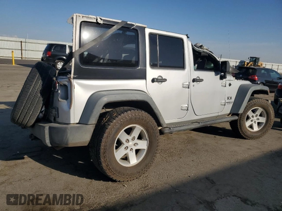 2008 Jeep Wrangler Unlimited X with VIN 1J4GB391X8L515128, listed as a Copart auction lot 74950764 with 188,884 mi miles and Salvage Title. Bid and sale history available at DreamBid. Image 3.