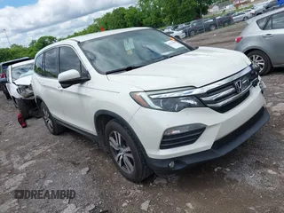 2017 Honda Pilot EX-L z VIN 5FNYF5H74HB044225, wystawiony jako IAAI lot #42211569 z przebiegiem 150 809 mil mil oraz . Historia ofert i sprzedaży dostępna na DreamBid. Obrazek 1.