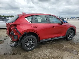 2019 Mazda CX-5 Sport with VIN JM3KFABM5K1597891, listed as a Copart auction lot 55020815 with 100,454 mi miles and Non Repairable. Bid and sale history available at DreamBid. Image 3.