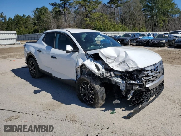 2022 Hyundai Santa Cruz SEL z VIN 5NTJBDAE5NH014097, wystawiony jako Copart lot #46309765 z przebiegiem 24 938 mil mil oraz Szkoda całkowita • Salvage title. Historia ofert i sprzedaży dostępna na DreamBid. Obrazek 4.