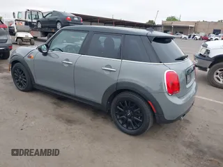 2015 MINI Hardtop 4 Door with VIN WMWXS5C52FT829699, listed as a IAAI auction lot 42078187 with 59,641 mi miles and . Bid and sale history available at DreamBid. Image 3.