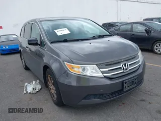 2013 Honda Odyssey EX z VIN 5FNRL5H44DB072698, wystawiony jako IAAI lot #42306458 z przebiegiem 157 703 mil mil oraz . Historia ofert i sprzedaży dostępna na DreamBid. Obrazek 1.