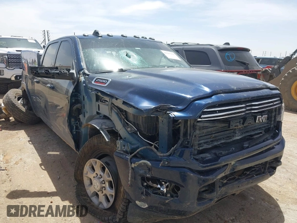 2022 Ram 2500 Laramie with VIN 3C6UR5FL1NG372673, listed as a IAAI auction lot 42247122 with 66,216 mi miles and . Bid and sale history available at DreamBid. Image 1.