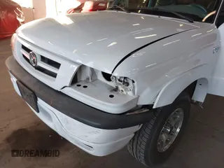 2002 Mazda B-Series 2WD Truck DS with VIN 4F4YR16V42TM25828, listed as a IAAI auction lot 41440414 with 132,334 mi miles. Bid and sale history available at carsss.com. Image 12.