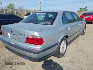 1998 BMW 7 Series 740il with VIN WBAGJ8324WDM11469, listed as a IAAI auction lot 42069641 with 1 mi miles. Bid and sale history available at carsss.com. Image 4.