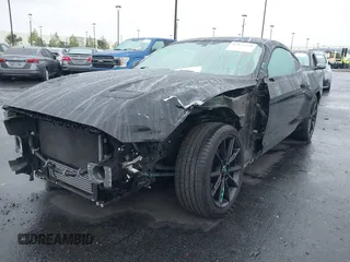 2019 Ford Mustang EcoBoost z VIN 1FA6P8TH2K5143582, wystawiony jako IAAI lot #42172259 z przebiegiem 53 614 mil mil oraz . Historia ofert i sprzedaży dostępna na DreamBid. Obrazek 2.