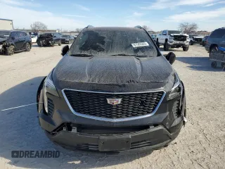 2023 Cadillac XT4 FWD Sport with VIN 1GYFZER47PF107311, listed as a Copart auction lot 87583565 with 26,585 mi miles and Salvage title. Bid and sale history available at DreamBid. Image 5.