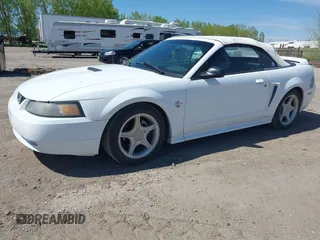1999 Ford Mustang GT z VIN 1FAFP45X1XF215757, wystawiony jako IAAI lot #42311086 z przebiegiem 138 832 mil mil oraz . Historia ofert i sprzedaży dostępna na DreamBid. Obrazek 2.
