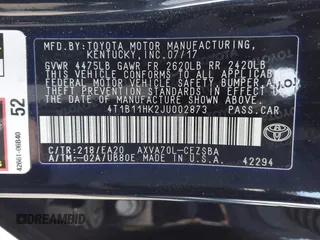 2018 Toyota Camry LE z VIN 4T1B11HK2JU002873, wystawiony jako IAAI lot #41637537 z przebiegiem 136 950 mil mil oraz . Historia ofert i sprzedaży dostępna na DreamBid. Obrazek 9.