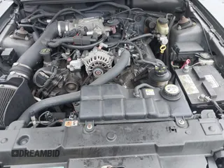 2004 Ford Mustang GT Deluxe z VIN 1FAFP45X74F128442, wystawiony jako IAAI lot #41580930 z przebiegiem 100 801 mil mil oraz . Historia ofert i sprzedaży dostępna na DreamBid. Obrazek 10.