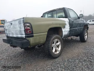 1996 Dodge Ram 1500 with VIN 1B7HF16Z4TS529974, listed as a IAAI auction lot 41522264 with 162,729 mi miles. Bid and sale history available at carsss.com. Image 4.