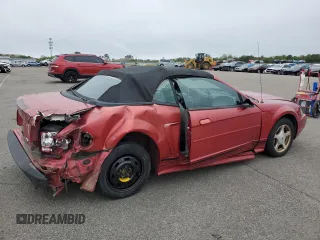 2001 Ford Mustang Deluxe с VIN 1FAFP444X1F234869, выставлен на аукционе Copart как лот 57380035 с пробегом 84 074 миль миль и Списание • Salvage title. История ставок и продаж доступна на DreamBid. Изображение 3.