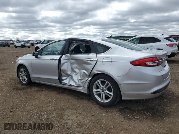2018 Ford Fusion SE с VIN 3FA6P0HDXJR130582, выставлен на аукционе Copart как лот 53169815 с пробегом 137 512 миль миль и Списание • Salvage title. История ставок и продаж доступна на DreamBid. Изображение 2.