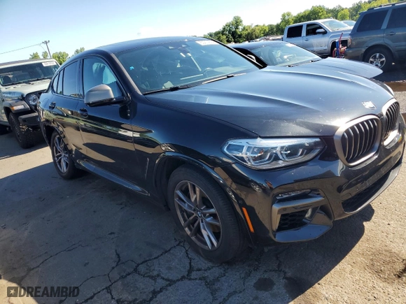 2021 BMW X4 M40i with VIN 5UX2V5C0XM9G31201, listed as a Copart auction lot 60274654 with 0 mi miles and Salvage Title. Bid and sale history available at carsss.com. Image 4.