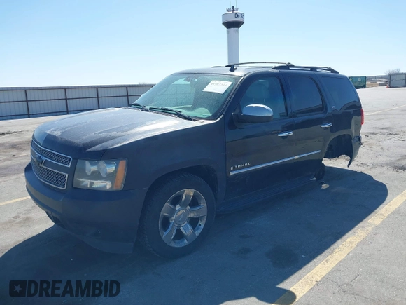 2008 Chevrolet Tahoe 1LT z VIN 1GNFK130X8J138051, wystawiony jako IAAI lot #41983344 z przebiegiem 235 811 mil mil oraz . Historia ofert i sprzedaży dostępna na DreamBid. Obrazek 18.