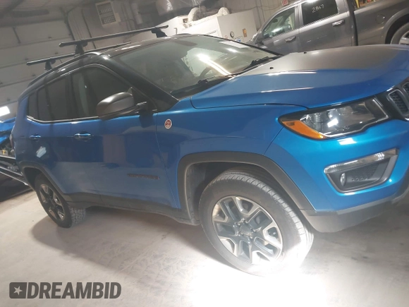2018 Jeep Compass Trailhawk with VIN 3C4NJDDB3JT234529, listed as a IAAI auction lot 41973123 with 173,559 mi miles and . Bid and sale history available at DreamBid. Image 13.