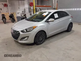 2013 Hyundai Elantra GT with VIN KMHD35LE3DU151891, listed as a IAAI auction lot 41869397 with 84,692 mi miles. Bid and sale history available at carsss.com. Image 2.