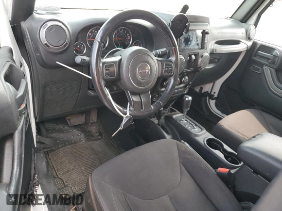 2015 Jeep Wrangler Sport с VIN 1C4AJWAG2FL572288, выставлен на аукционе Copart как лот 59844615 с пробегом 80 145 миль миль и Чистый • Clean title. История ставок и продаж доступна на DreamBid. Изображение 8.