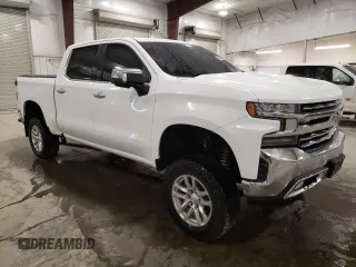 2021 Chevrolet Silverado 1500 LTZ with VIN 1GCUYGED8MZ339153, listed as a Copart auction lot 47932015 with 127,270 mi miles and Salvage Title. Bid and sale history available at DreamBid. Image 4.