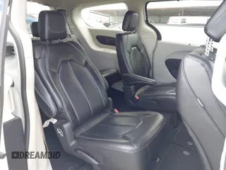 2023 Chrysler Pacifica Touring L with VIN 2C4RC1BG6PR550575, listed as a IAAI auction lot 42576498 with 54,373 mi miles and . Bid and sale history available at DreamBid. Image 8.