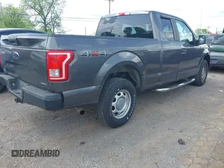 2015 Ford F-150 XLT with VIN 1FTEX1E89FKD84587, listed as a IAAI auction lot 42102545 with 141,265 mi miles. Bid and sale history available at carsss.com. Image 4.