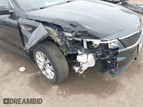 2017 Kia Optima LX z VIN 5XXGT4L36HG145802, wystawiony jako IAAI lot #42280279 z przebiegiem 74 512 mil mil oraz . Historia ofert i sprzedaży dostępna na DreamBid. Obrazek 6.