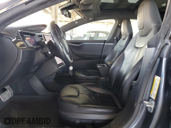 2014 Tesla Model S 60 with VIN 5YJSA1H17EFP63229, listed as a Copart auction lot 51776195 with 156,356 mi miles and Salvage Title. Bid and sale history available at DreamBid. Image 7.