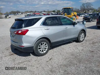 2018 Chevrolet Equinox LT z VIN 2GNAXJEV6J6186718, wystawiony jako IAAI lot #41867409 z przebiegiem 109 244 mil mil oraz . Historia ofert i sprzedaży dostępna na DreamBid. Obrazek 4.