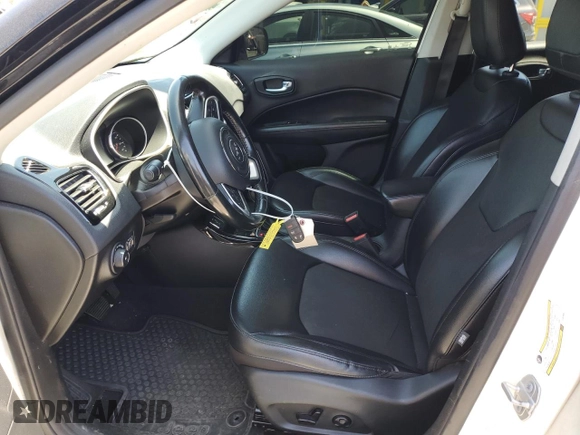 2020 Jeep Compass Latitude with VIN 3C4NJCBB8LT257630, listed as a Copart auction lot 58979745 with 128,196 mi miles and Salvage title. Bid and sale history available at DreamBid. Image 7.