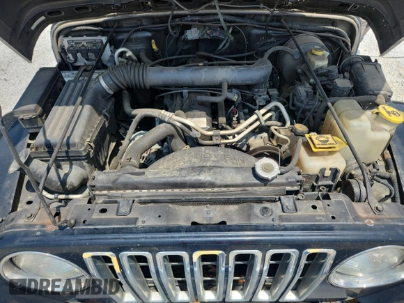 2001 Jeep Wrangler Sport с VIN 1J4FA49S91P347090, выставлен на аукционе Copart как лот 60436405 с пробегом 141 172 миль миль и Списание • Salvage title. История ставок и продаж доступна на DreamBid. Изображение 12.