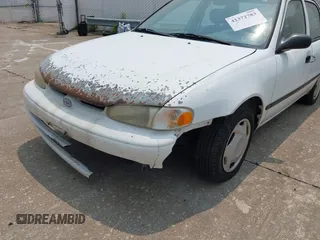 2001 Chevrolet Prizm z VIN 1Y1SK52881Z428636, wystawiony jako IAAI lot #42372783 z przebiegiem 169 729 mil mil oraz . Historia ofert i sprzedaży dostępna na DreamBid. Obrazek 6.