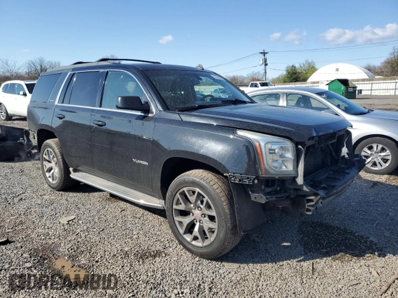 2015 GMC Yukon SLE with VIN 1GKS2AKC1FR169629, listed as a Copart auction lot 51914005 with 139,777 mi miles and Salvage Title. Bid and sale history available at DreamBid. Image 4.