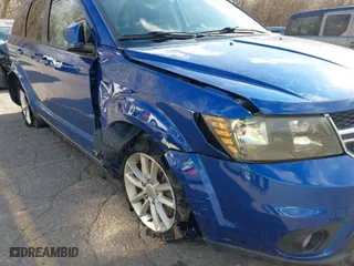2015 Dodge Journey SXT with VIN 3C4PDCBG1FT743938, listed as a IAAI auction lot 40789907 with 124,781 mi miles. Bid and sale history available at carsss.com. Image 6.