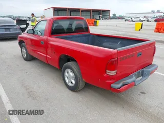 1997 Dodge Dakota with VIN 1B7FL26X4VS173260, listed as a IAAI auction lot 42159512 with 125,879 mi miles and . Bid and sale history available at carsss.com. Image 3.