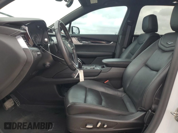 2021 Cadillac XT6 Premium Luxury with VIN 1GYKPCRSXMZ169206, listed as a Copart auction lot 55953525 with 64,789 mi miles and Salvage Title. Bid and sale history available at DreamBid. Image 7.