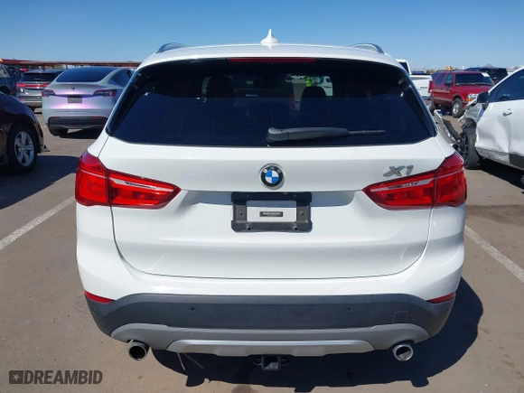 2017 BMW X1 xDrive28i with VIN WBXHT3C30H5F68187, listed as a IAAI auction lot 41830892 with 101,313 mi miles. Bid and sale history available at carsss.com. Image 16.